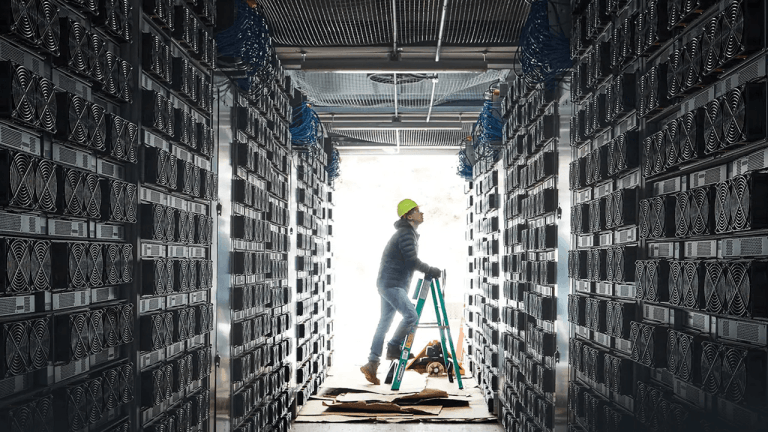 Engineer overseeing bitcoin mining facility